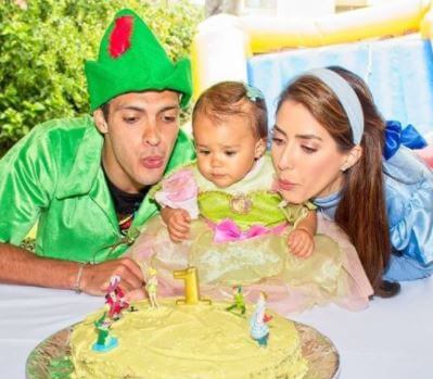 Arya Jimenez with her parents Raul Jimenez and Daniela Basso celebrating her birthday.